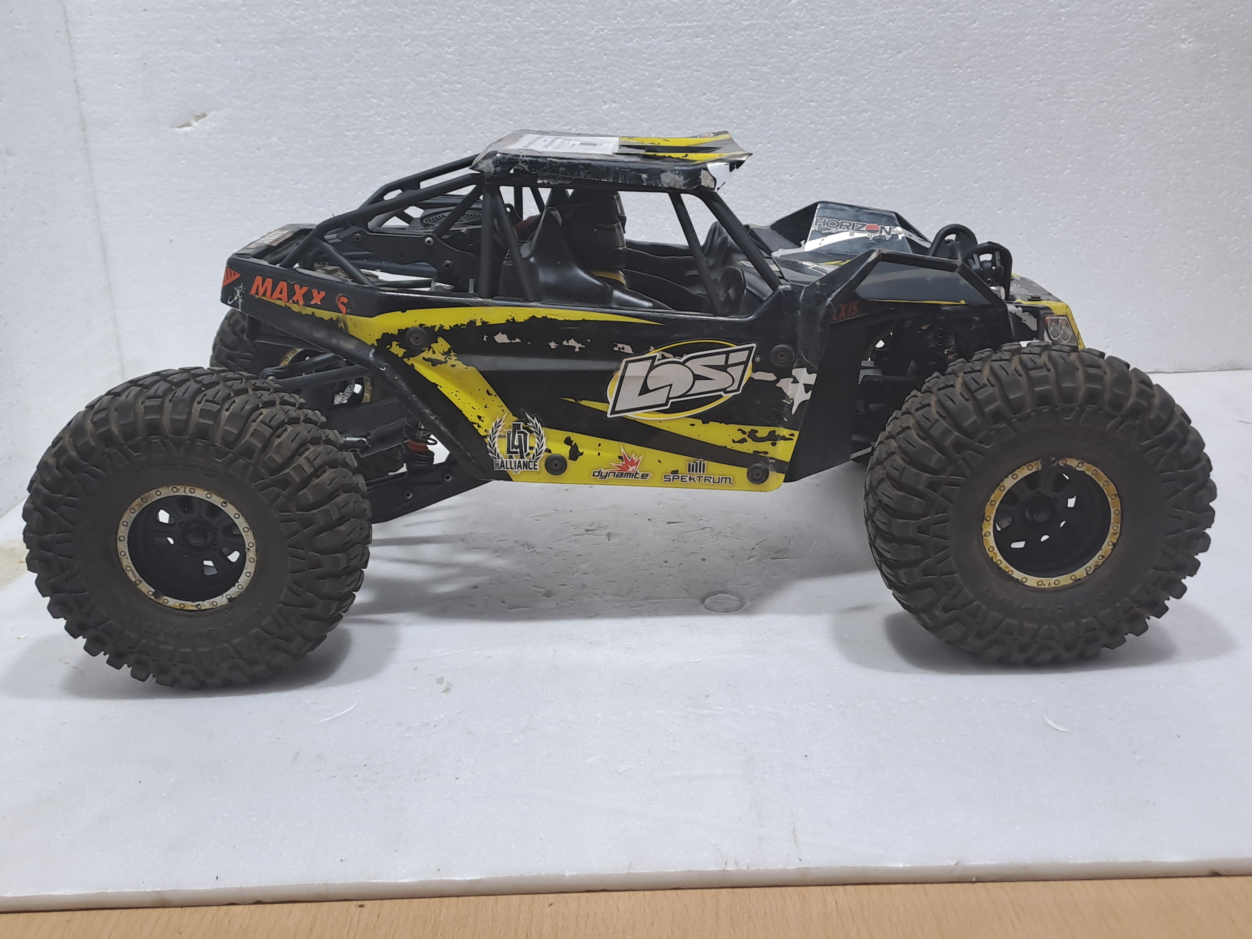 LOSI 1/10 SCALE ROCKREY 4WD BRUSHLESS MOTOR BLACK & YELLOW QUALITY PRE OWNED