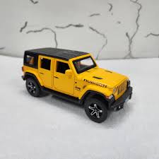 JEEP RUBICON RC CAR 1/24 SCALE DIECAST MODEL WITH RECHARGEABLE BATTERY YELLOW  (JP-25049)1:24 R/C 4 FUNC. CAR W/ CHARGER & LIGHT